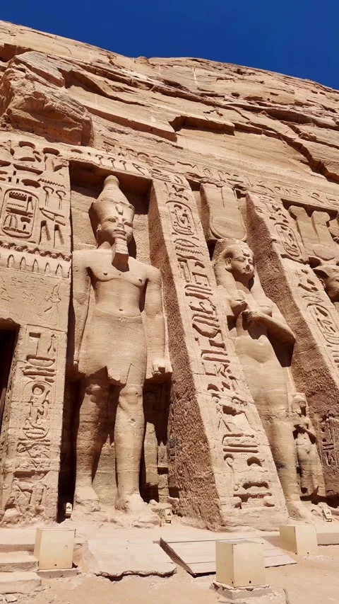 Colossal statues of pharaoh ramesses ii at abu simbel temple in egypt Stock Footage 338331623