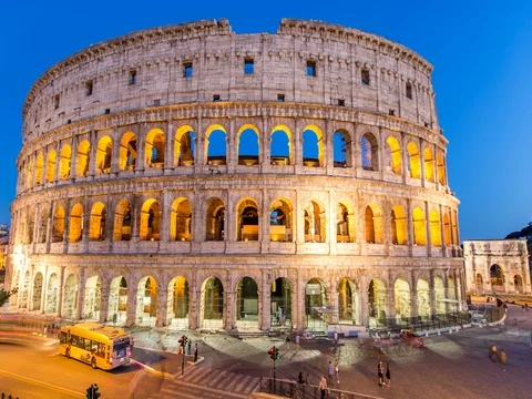 The Colosseum or Coliseum day to night time lapse in Rome, Italy Stock Footage 76240664