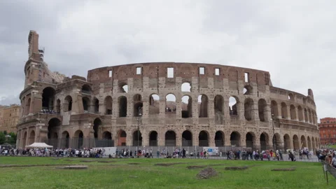 Colosseum Outer Wall with Tourist Queue and Lawn Area Stock Footage 341128058