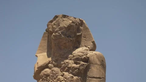 Colossi of Memnon face closeup 스톡 동영상 244738924