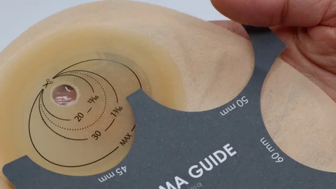 Colostomy bag, supply needed after colostomy surgery. Using stoma guide. Stock Footage 122126837