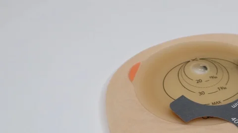 Colostomy bag, supply needed after colostomy surgery. Using stoma guide. Stock Footage 122126880