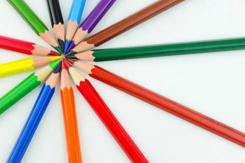 Colour crayons in circle Stock Photos