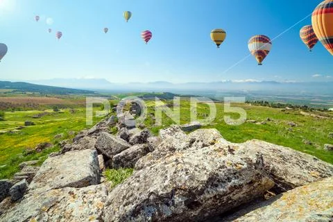 Colour hot air balloons fly in clear blue sky Stock Photos