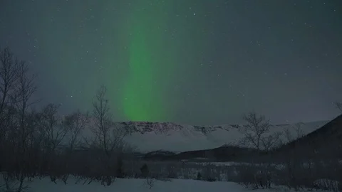 Colour northern lights dancing in dark skies and stars run through the sky. Stock Footage 123019647