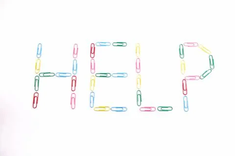Colour paper clips - word HELP Stock Photos