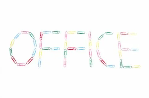 Colour paper clips - word OFFICE Stock Photos