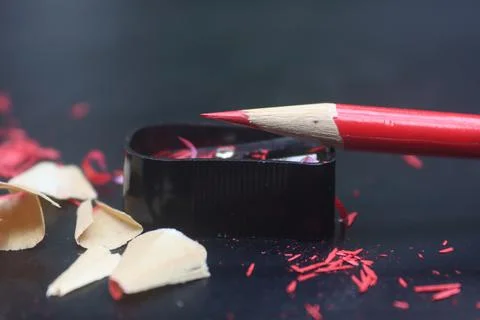 Colour pencil sharpening with sharpener stock images Stock Photos