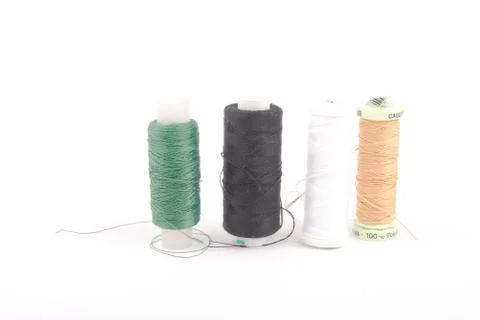 Coloured bobbins of thread Stock Photos
