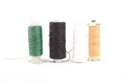 Coloured bobbins of thread Stock Photos