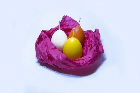 Coloured candles for easter 2023 Stock Photos