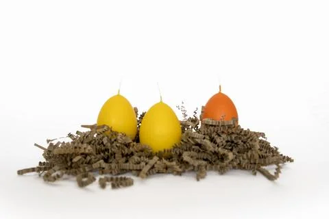 Coloured candles for easter 2023 Stock Photos