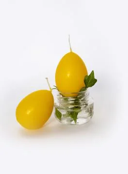 Coloured candles for easter 2023 Stock Photos