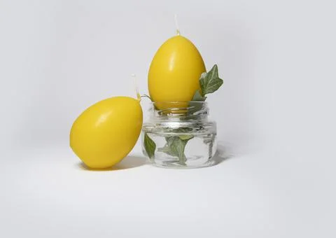 Coloured candles for easter 2023 Stock Photos