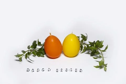 Coloured candles for easter 2023 Stock Photos