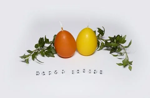 Coloured candles for easter 2023 Stock Photos