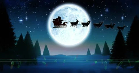 Coloured christmas string lights flashing over winter scene with santa passing Stock Footage 253457674