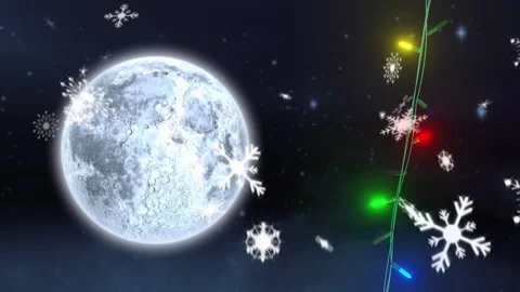 Coloured christmas string lights flashing falling snowflakes and full moon in Stock Footage 310924868
