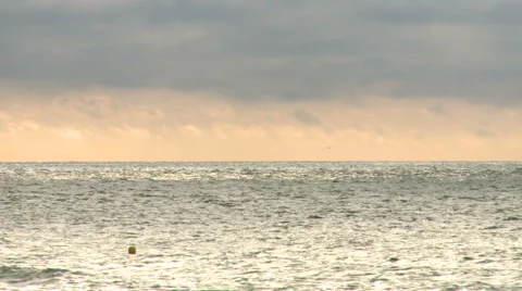 Coloured clouds at sunset over the North Sea Stock Footage 55492910