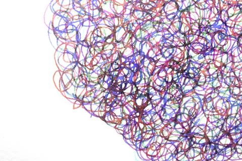Coloured ink pen scribbled wavy messy tengled lines on white background Stock Photos