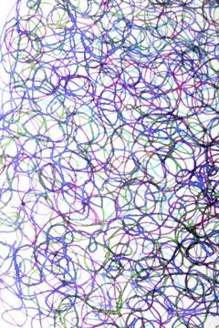Coloured ink pen scribbled wavy messy tengled lines on white background Stock Photos