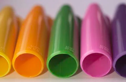 Coloured lids close up Stock Photos