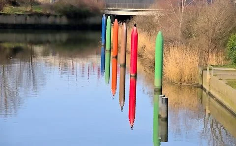 Coloured mooring posts Stock Photos