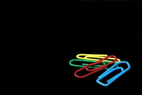 Coloured paperclips Stock Photos