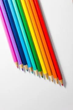 Coloured pencils lined up Stock Photos
