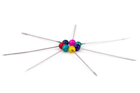 Coloured sewing pins on a white background isolated Foto stock