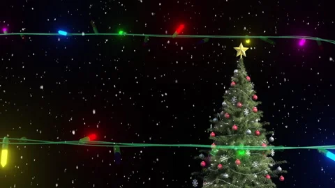 Coloured string lights flashing over christmas tree and falling snow in night Stock Footage 310924824