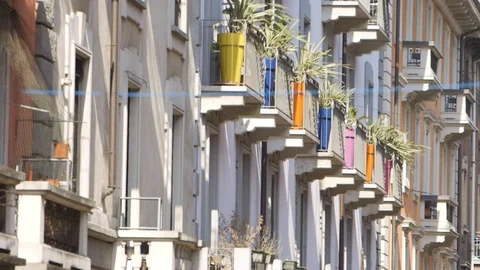 Coloured vases in town Stock Footage 90386245