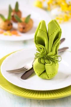 Colourful and bright festive Easter table setting with vintage silveware Stock Photos