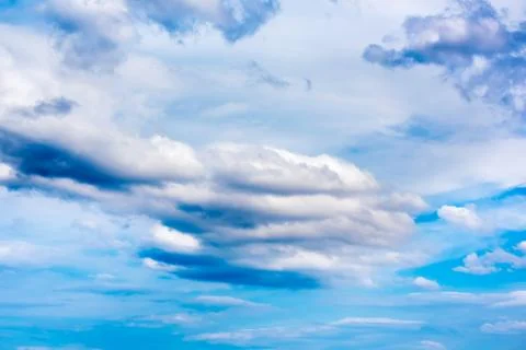 Colourful and creative clouds composition on sunset sky Stock Photos