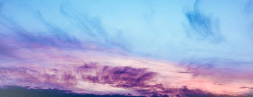 Colourful and creative clouds composition on sunset sky Stock Photos