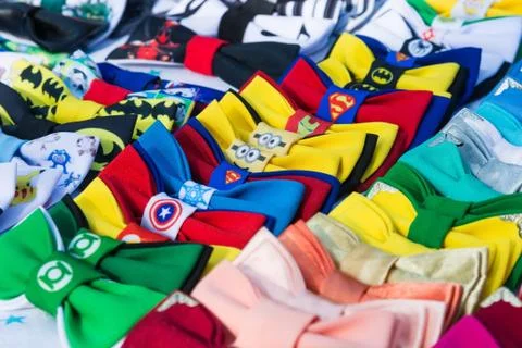 Colourful bow ties superhero motives for sale Stock Photos