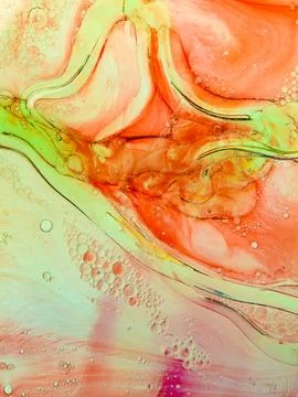 Colourful bubbles in backlit oily water Stock Photos