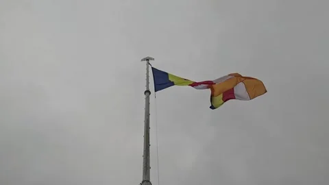 Colourful Buddhist Flag Waving in Cloudy Weather Stock Footage 345618193