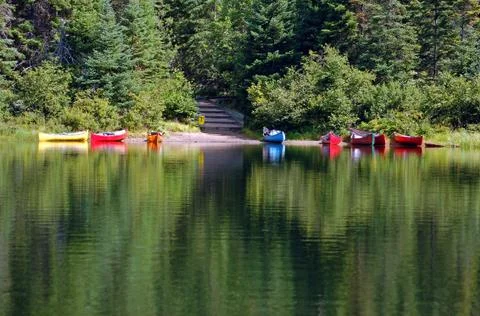 Colourful canoes Stock Photos