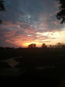 Colourful clouds with sunset Stock Photos