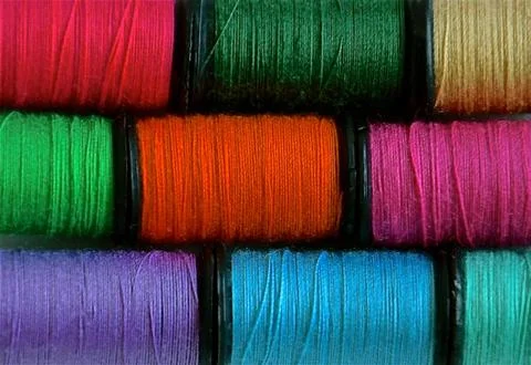 Colourful cotton spools Stock Photos