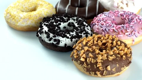 Colourful donuts with different tastes Stock Footage 87237136