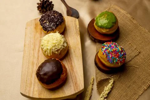 Colourful Donuts with Spoon Stock Photos