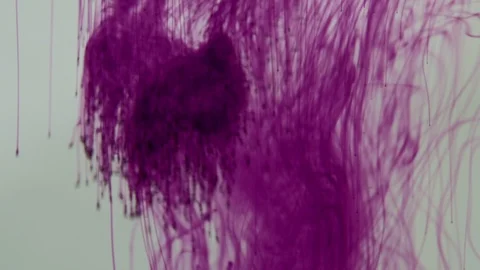 Colourful dynamic abstract background. Potassium permanganate crystals in water Stock Footage 125391847
