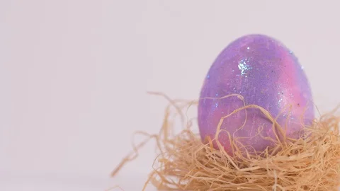 Colourful Easter Egg Rotating on White Background, Easter 스톡 동영상 129066297