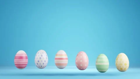 Colourful Easter eggs with different patterns aligned on a blue background Stock Footage 264141104