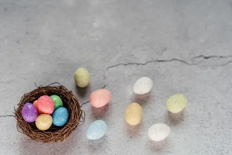 Colourful Easter eggs on gray cement background Stock Photos