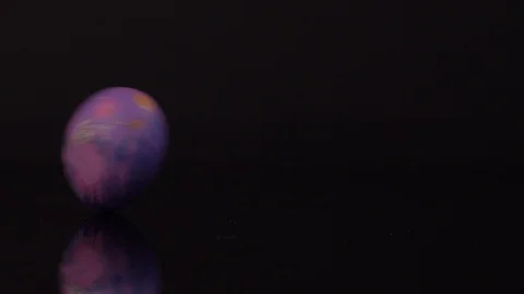 Colourful Easter Eggs Rolling on Black Background. Easter 스톡 동영상 129073697