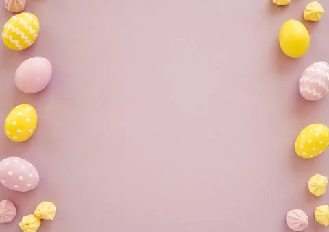 Colourful easter eggs with small sweets table Stock Photos