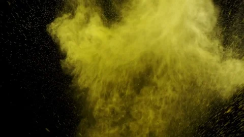 Colourful exploding powder over black background Stock Footage 84719080